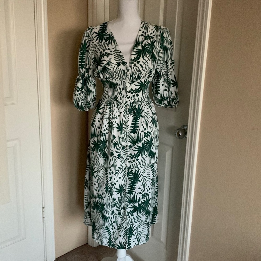 Button down green leaves dress. Fits small to large.
